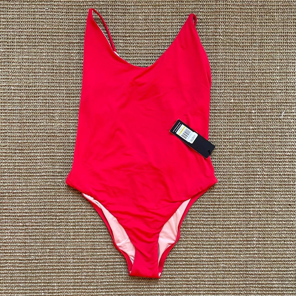 NWT Dolce Vita red swimsuit with metal detail.